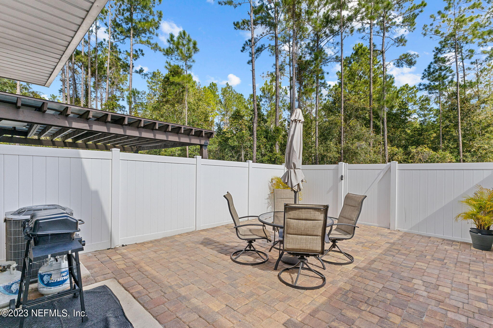 595 Servia Drive St. Johns, FL 32259 - Photo 28 of 56 a view of a table and chairs in patio