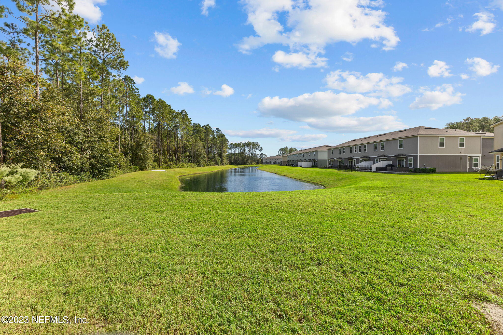 595 Servia Drive St. Johns, FL 32259 - Photo 29 of 56 a view of a lake with houses in the background