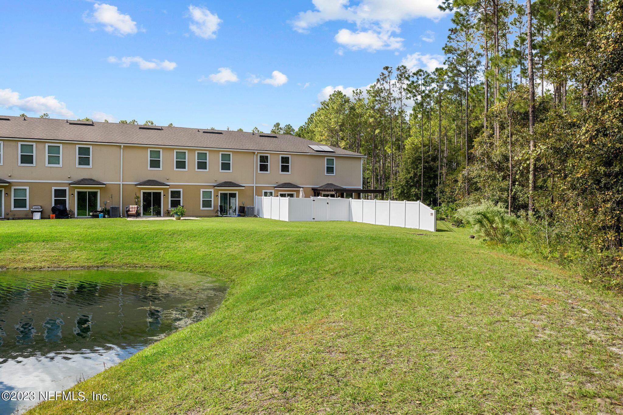 595 Servia Drive St. Johns, FL 32259 - Photo 30 of 56 a view of house with yard and green space