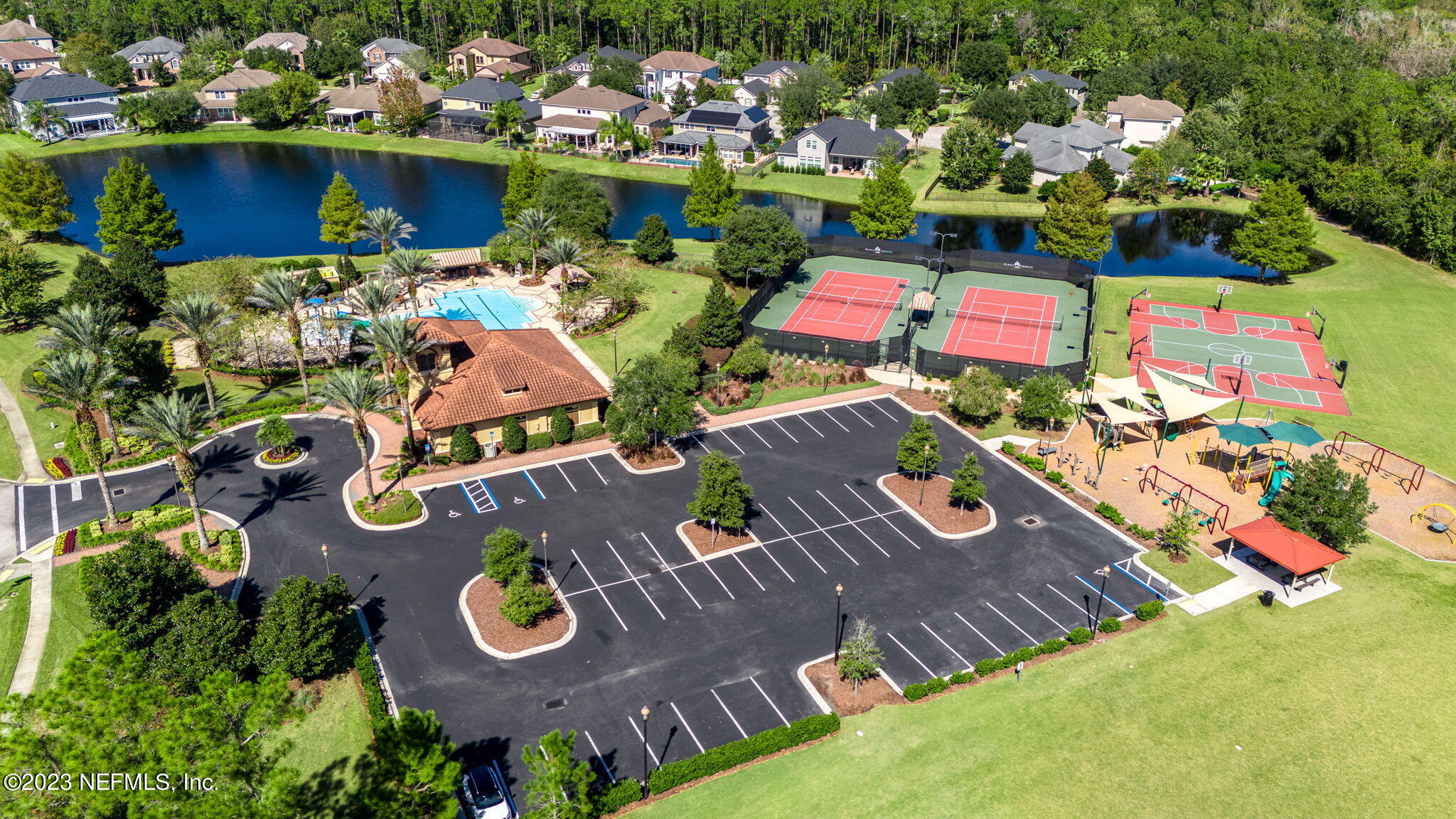 595 Servia Drive St. Johns, FL 32259 - Photo 35 of 56 an aerial view of a house with yard swimming pool and outdoor seating