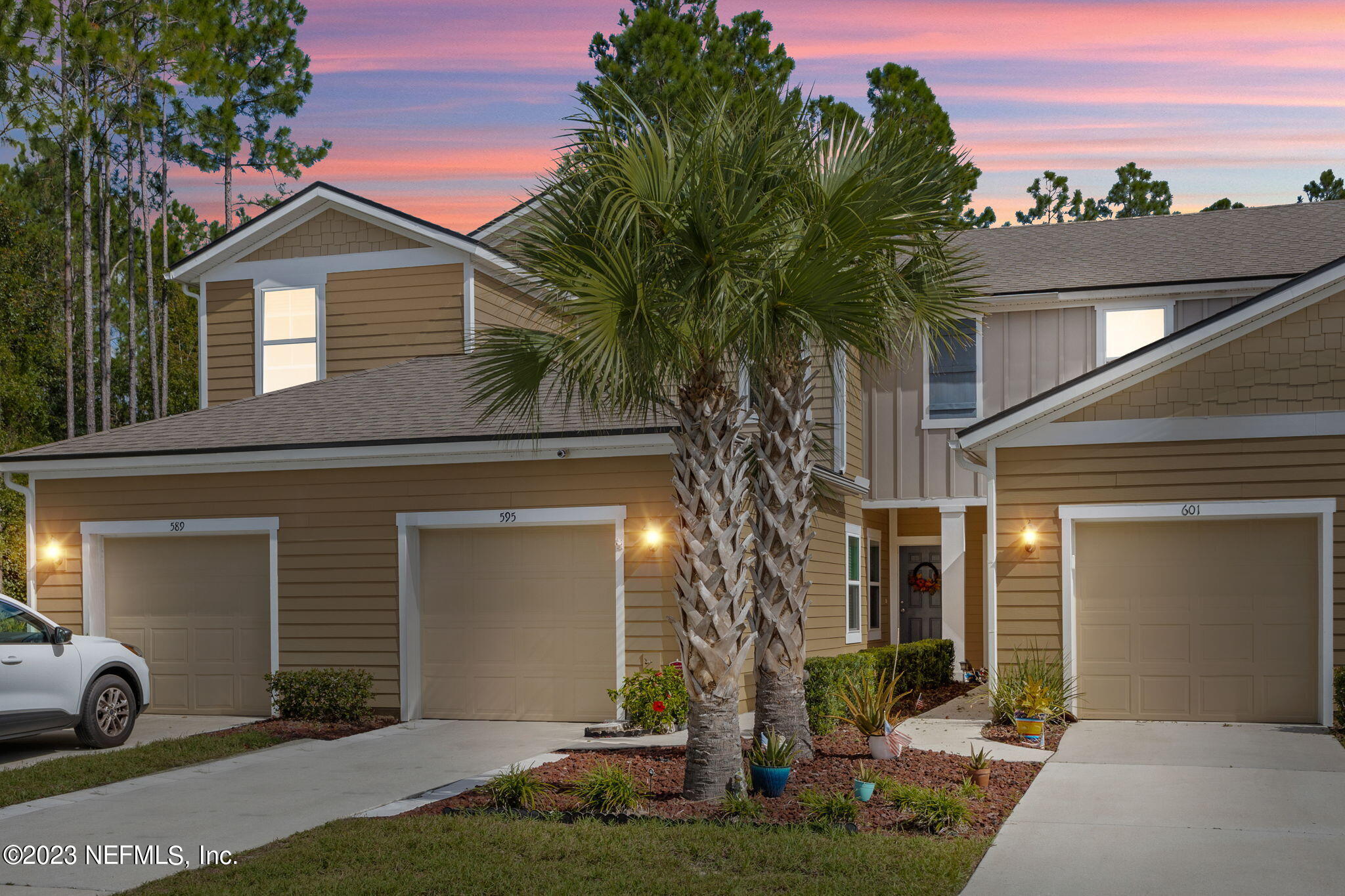 595 Servia Drive St. Johns, FL 32259 - Photo 6 of 56 a front view of a house with garden