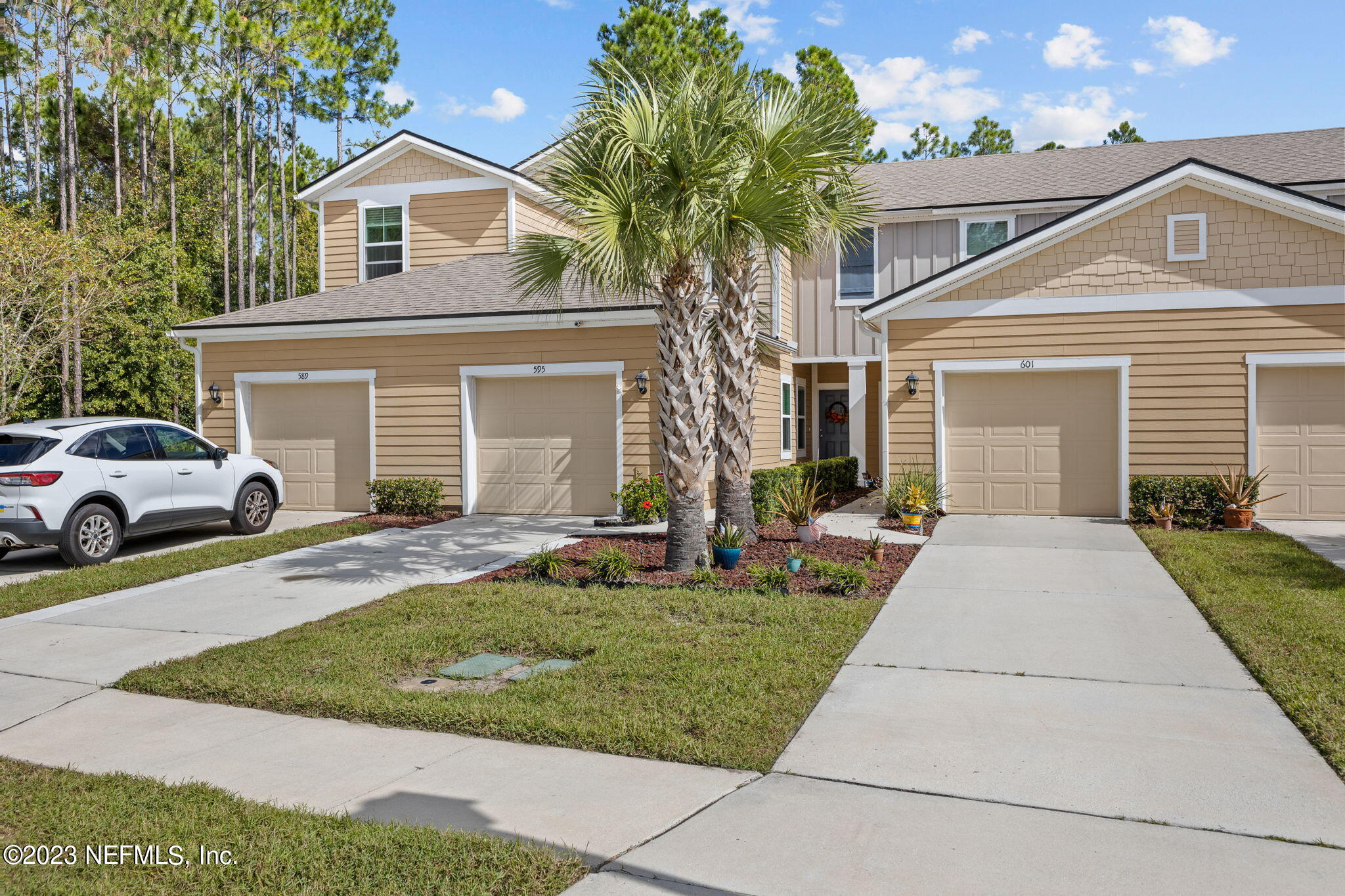 595 Servia Drive St. Johns, FL 32259 - Photo 7 of 56 a front view of a house with a yard