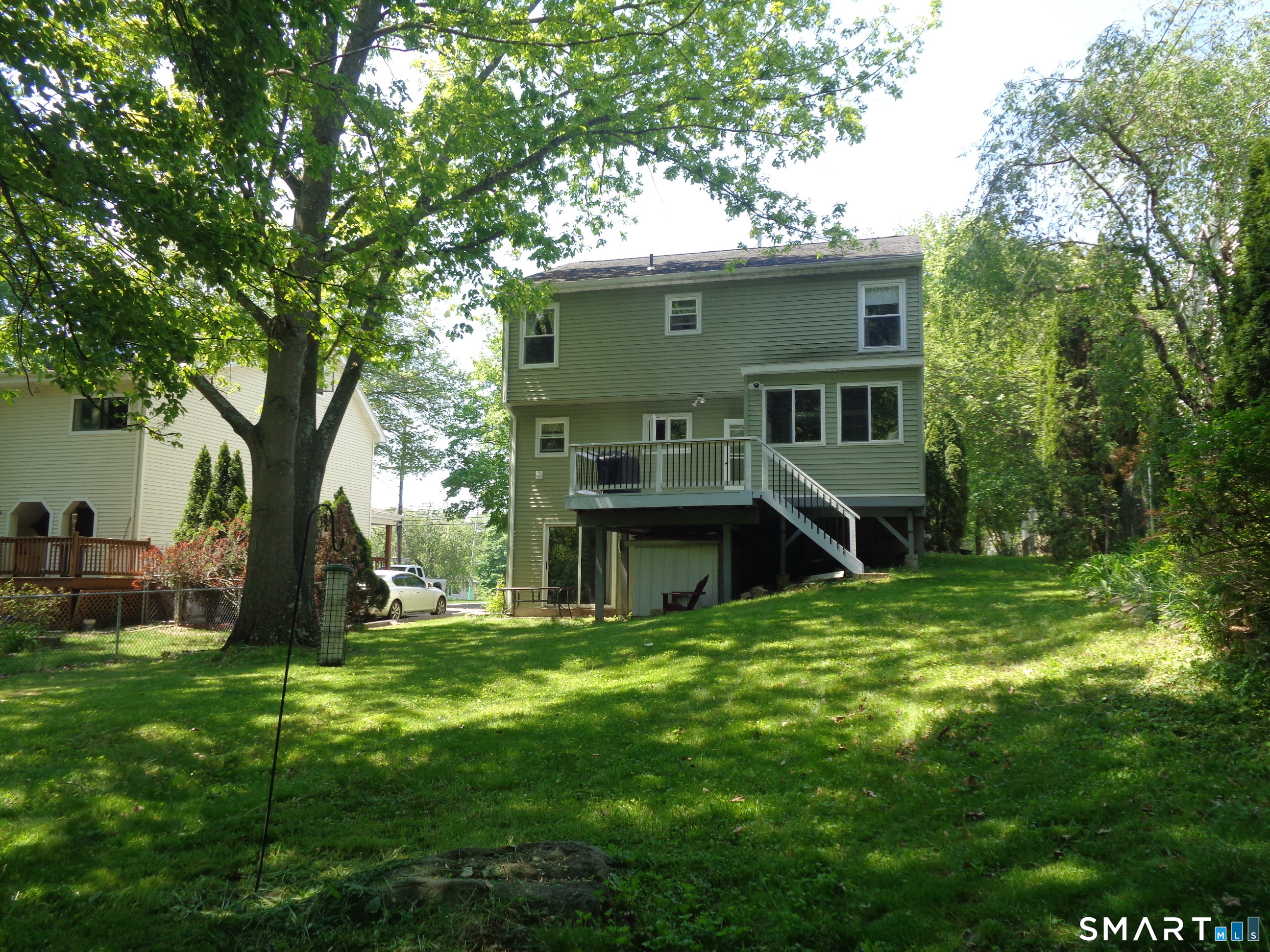 321 Spring Street Naugatuck, CT 06770 - Photo 2 of 27 a view of a house with backyard and sitting area