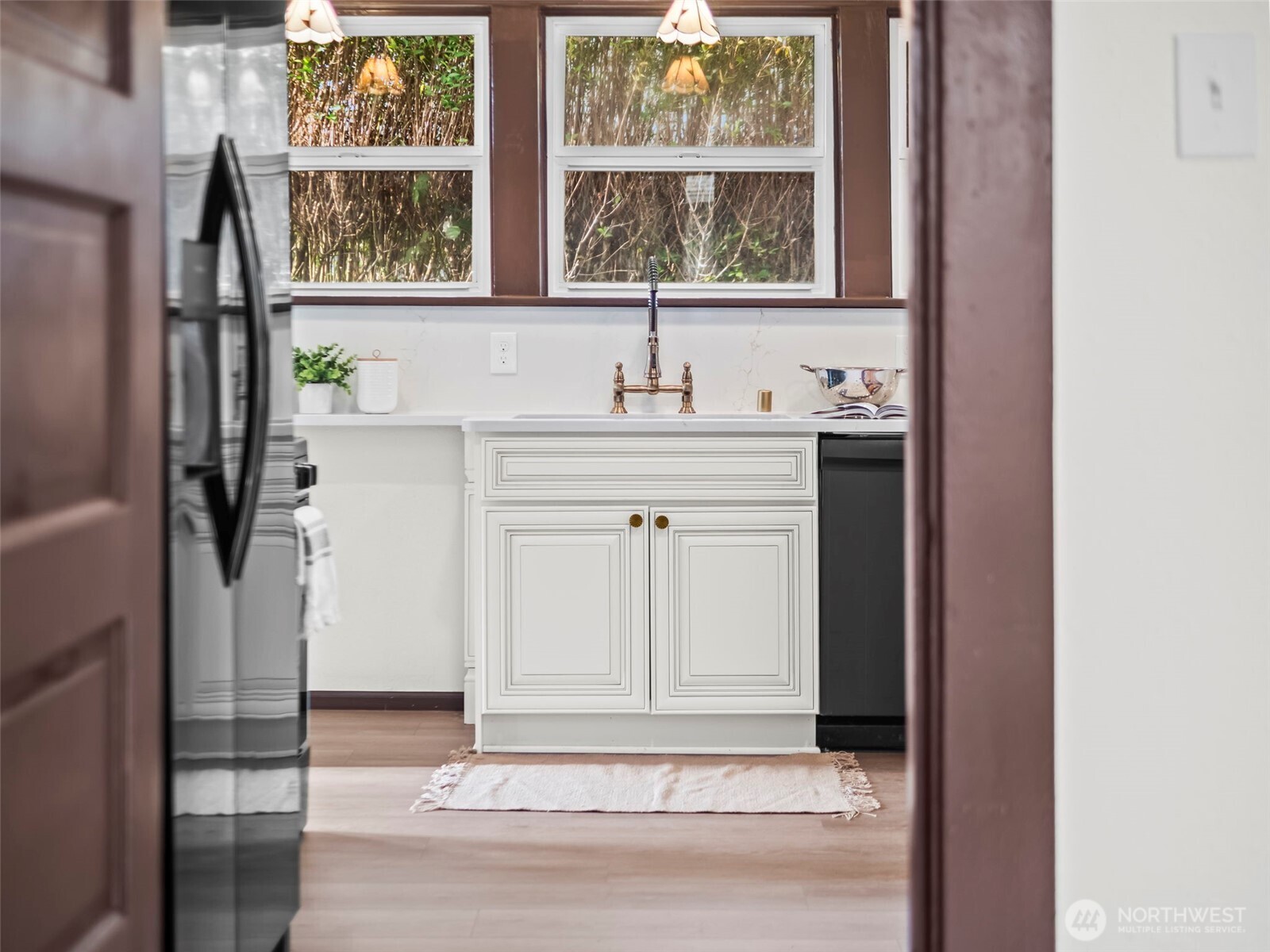 504 Dupont Avenue DuPont, WA 98327 - Photo 15 of 39 a bathroom with a sink and a window