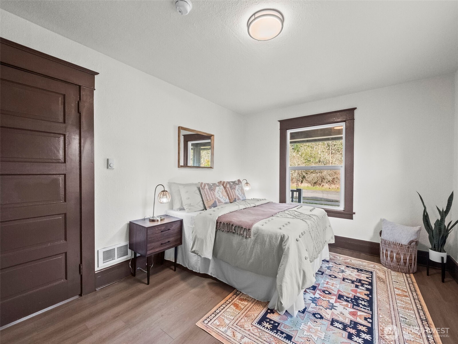 504 Dupont Avenue DuPont, WA 98327 - Photo 16 of 39 a bedroom with a bed and a window