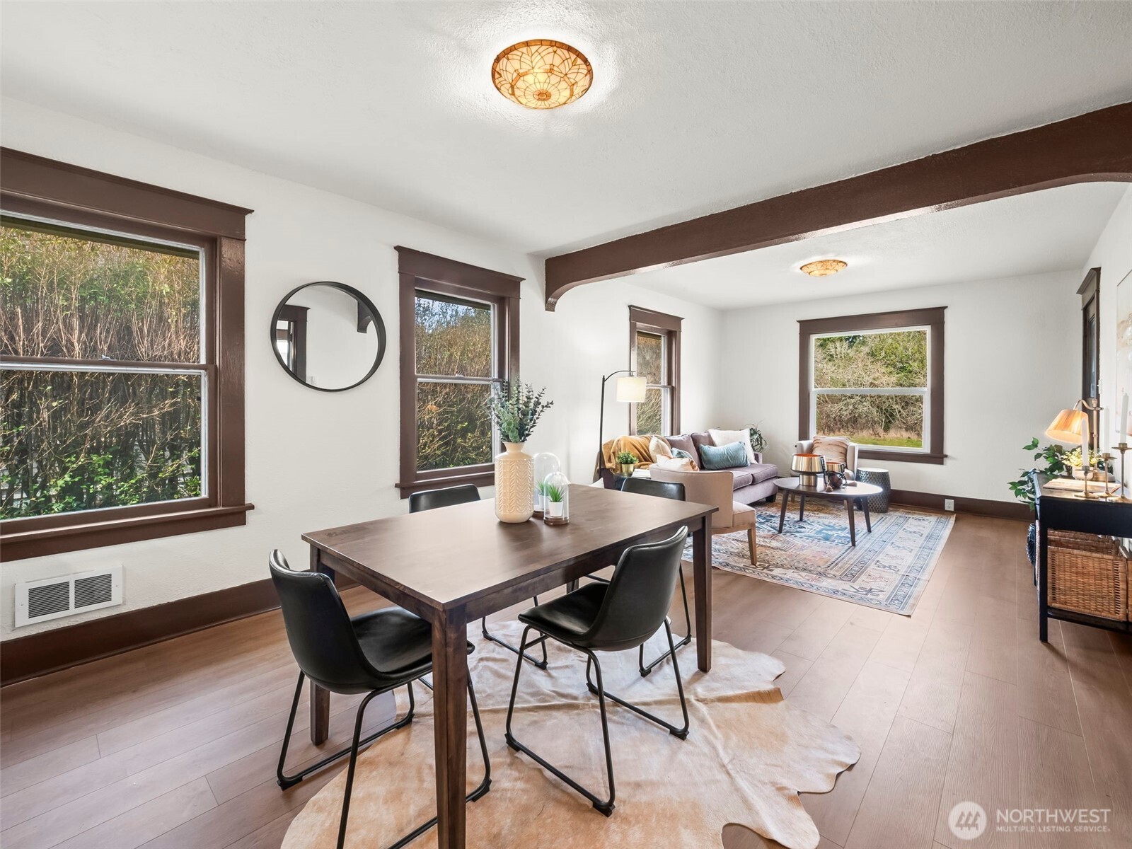 504 Dupont Avenue DuPont, WA 98327 - Photo 9 of 39 a view of a dining room with furniture window and wooden floor
