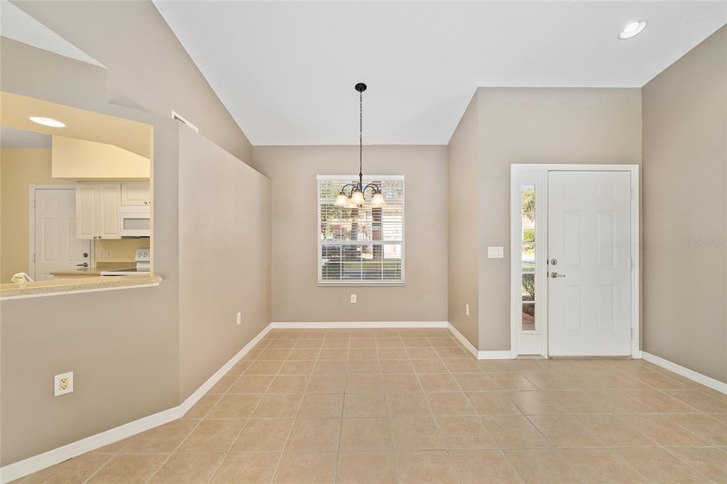 5427 Compass Point, Unit 1 Oxford, FL 34484 - Photo 12 of 51 a view of an empty room with a window