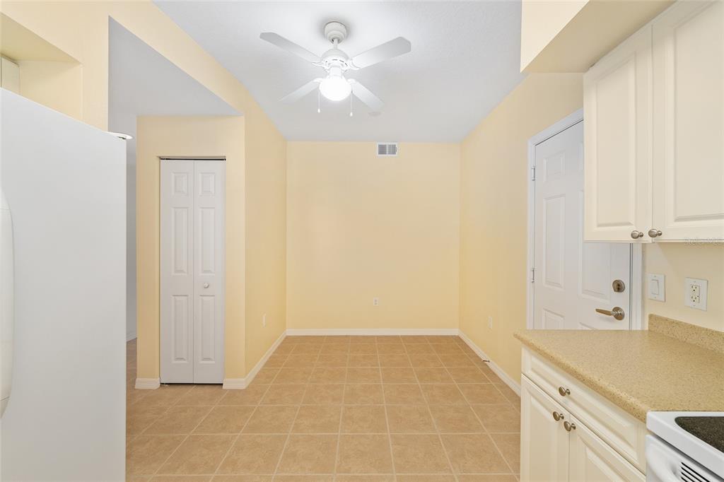 5427 Compass Point, Unit 1 Oxford, FL 34484 - Photo 19 of 51 a bathroom with a granite countertop sink and a mirror