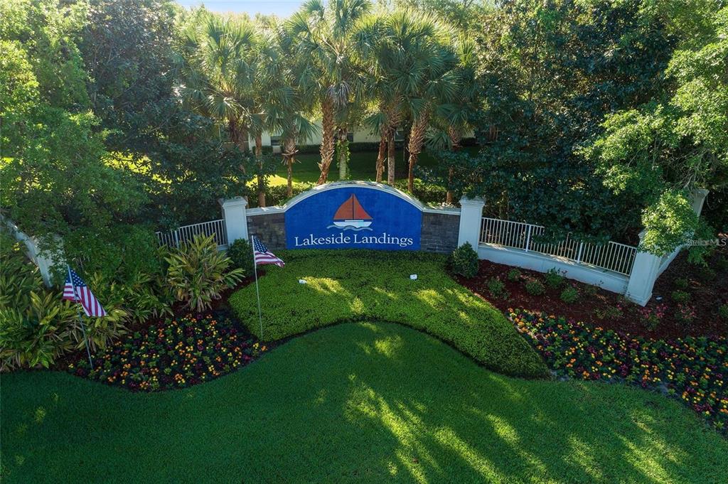5427 Compass Point, Unit 1 Oxford, FL 34484 - Photo 35 of 51 a view of a bench in a garden