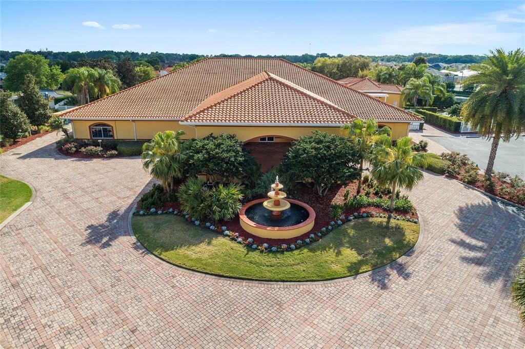5427 Compass Point, Unit 1 Oxford, FL 34484 - Photo 37 of 51 a view of a house with a yard and potted plants