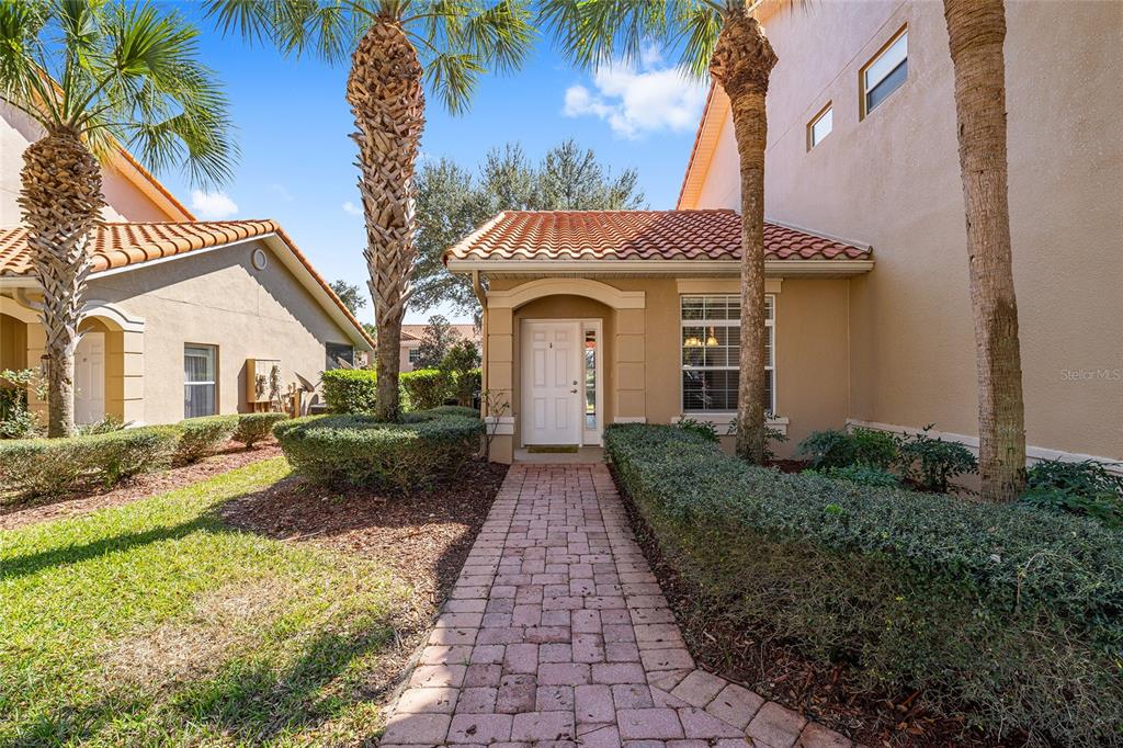 5427 Compass Point, Unit 1 Oxford, FL 34484 - Photo 5 of 51 a front view of a house with yard