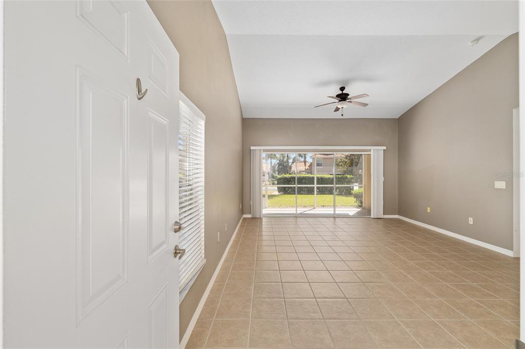 5427 Compass Point, Unit 1 Oxford, FL 34484 - Photo 7 of 51 a view of an empty room with a window