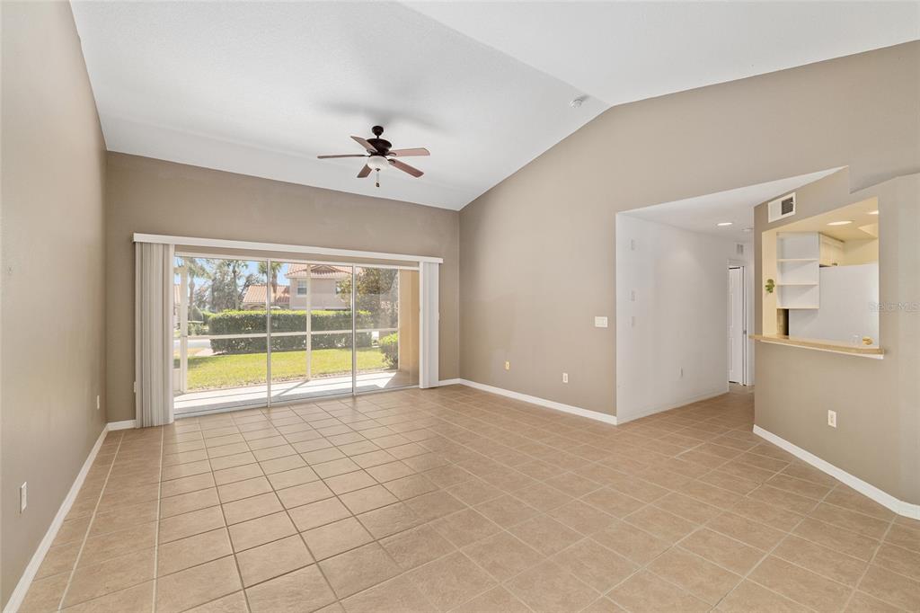 5427 Compass Point, Unit 1 Oxford, FL 34484 - Photo 8 of 51 a view of an empty room with a window