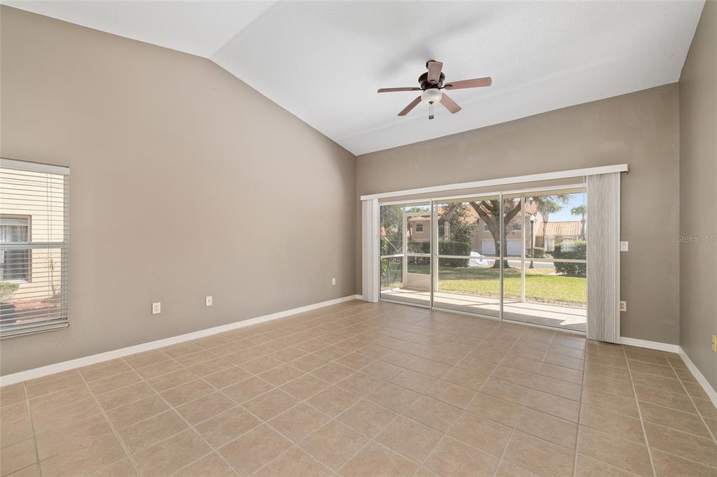5427 Compass Point, Unit 1 Oxford, FL 34484 - Photo 9 of 51 a view of an empty room with a window