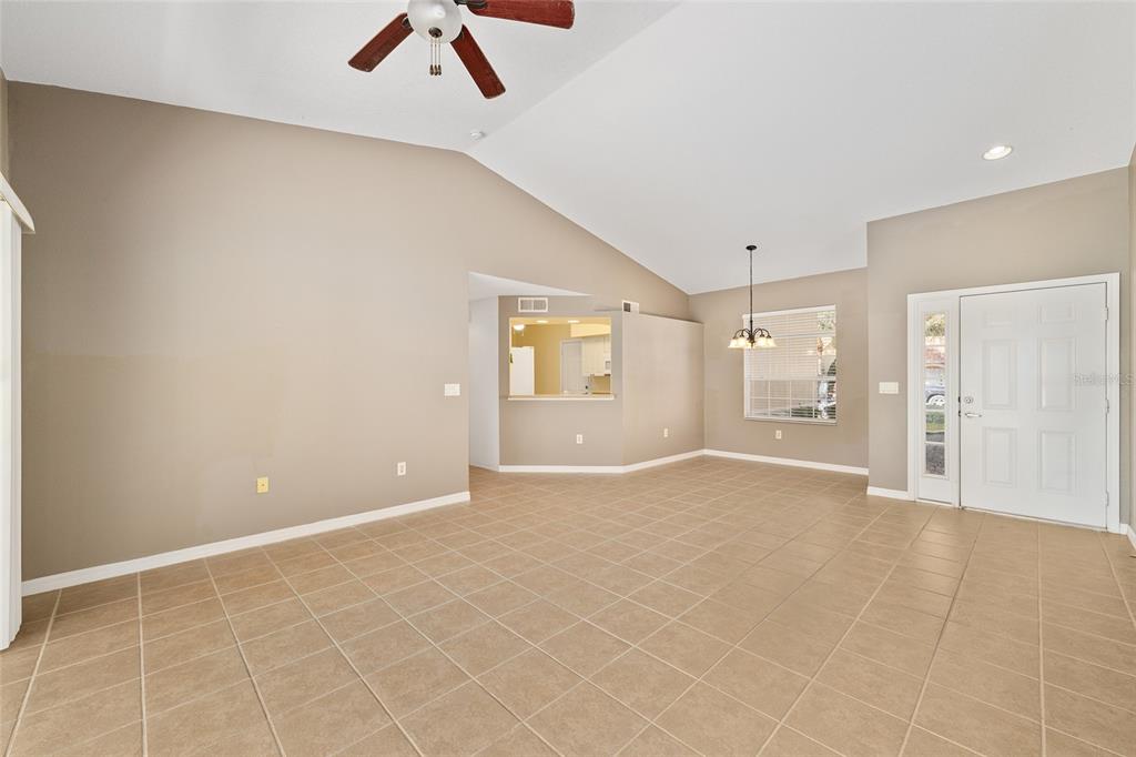 5427 Compass Point, Unit 1 Oxford, FL 34484 - Photo 10 of 51 a view of an empty room with a window