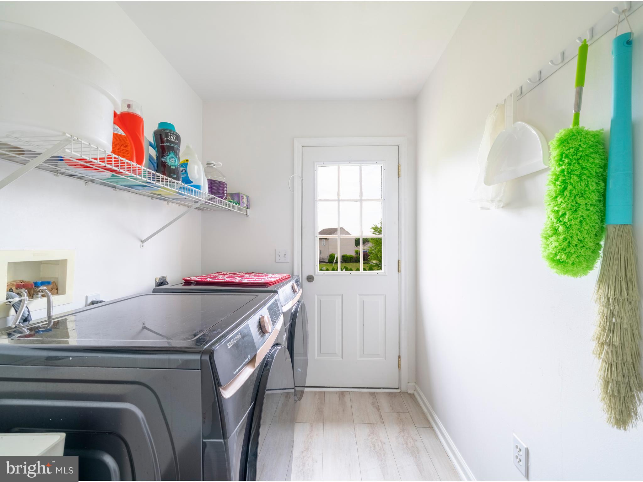 745 Apple Tree Lane Mount Wolf, PA 17347 - Photo 14 of 39 a utility room with dryer and washer