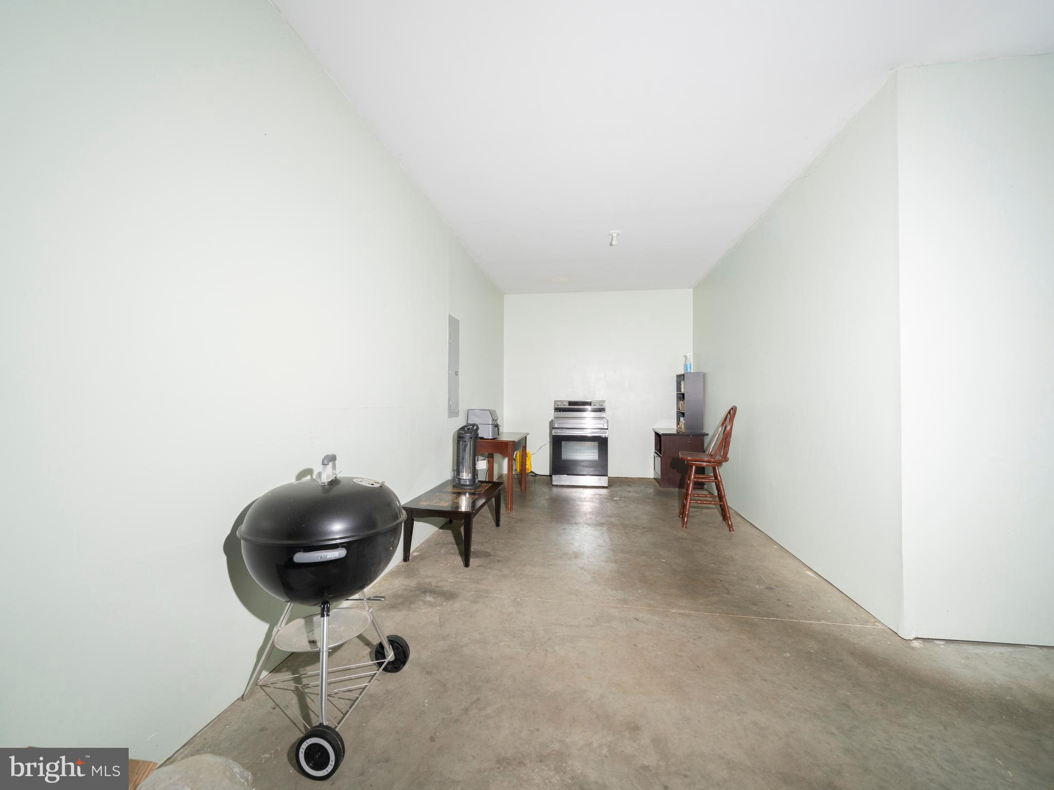 745 Apple Tree Lane Mount Wolf, PA 17347 - Photo 16 of 39 an empty room with a table and chairs