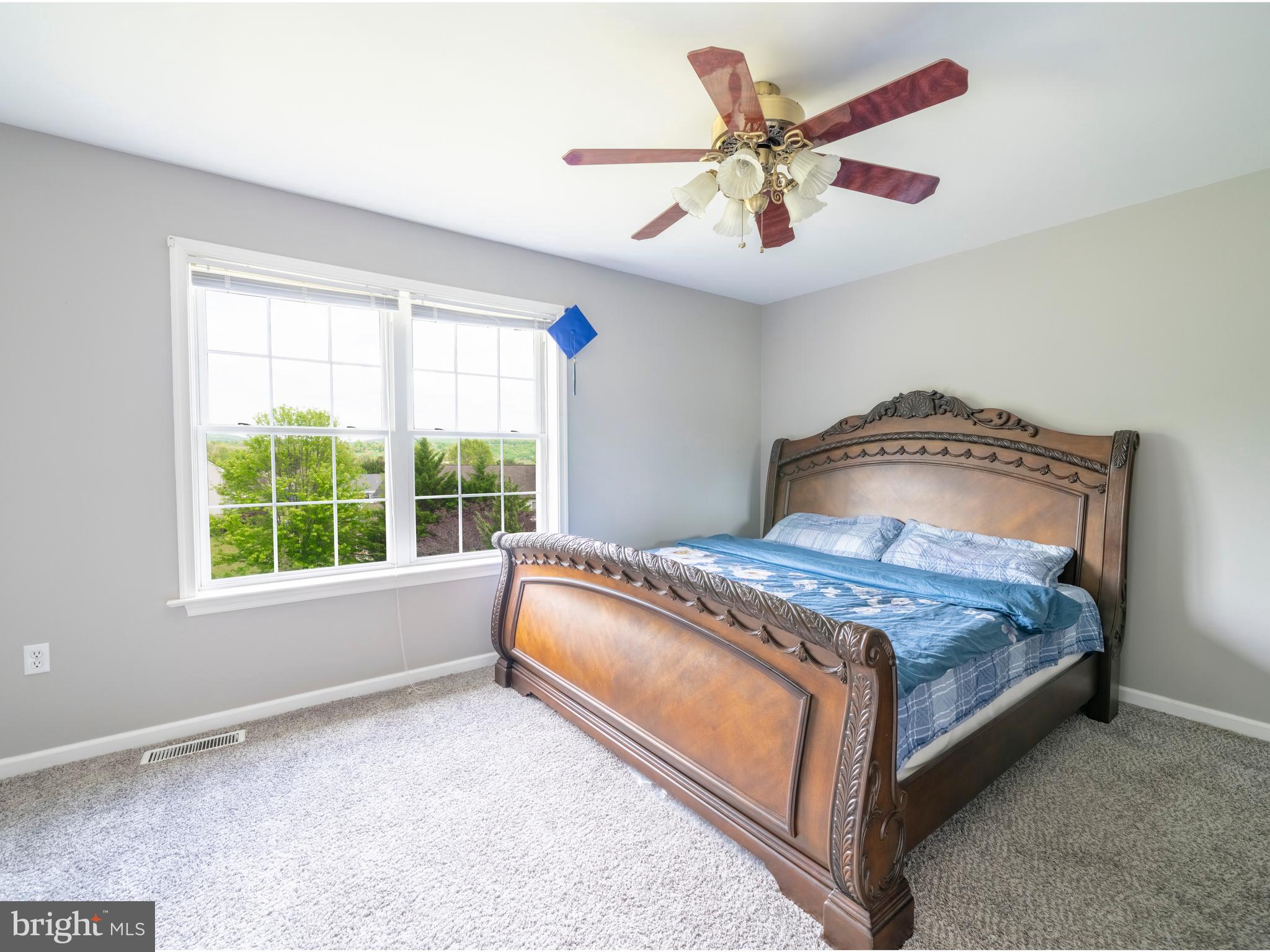 745 Apple Tree Lane Mount Wolf, PA 17347 - Photo 21 of 39 a bedroom with a bed and window