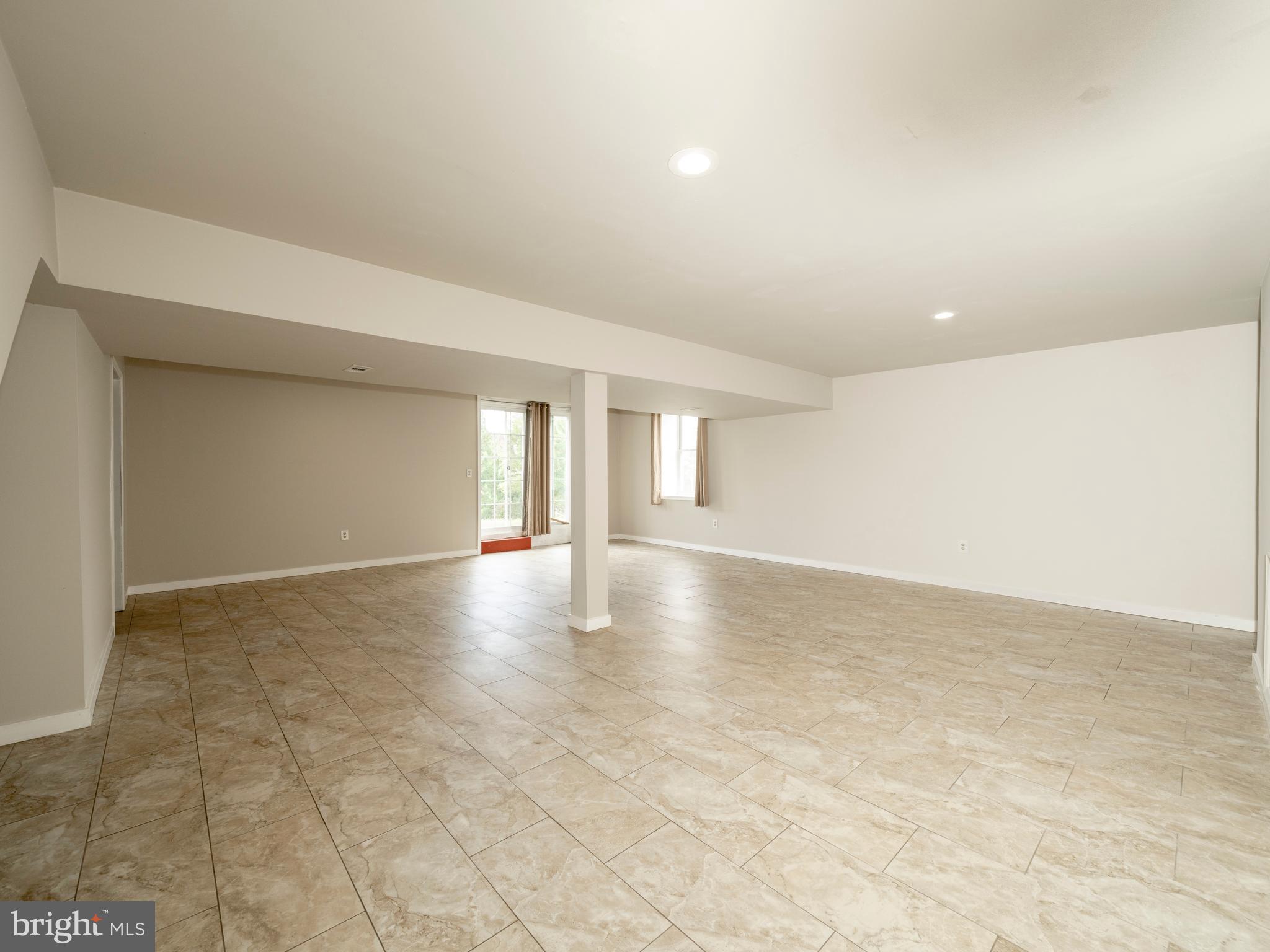 745 Apple Tree Lane Mount Wolf, PA 17347 - Photo 26 of 39 a view of empty room with wooden floor and fan