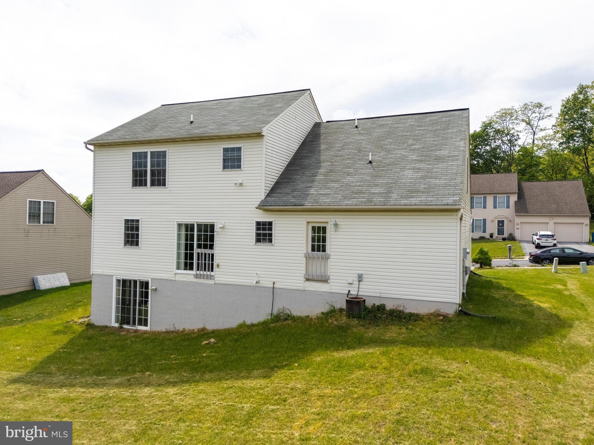 745 Apple Tree Lane Mount Wolf, PA 17347 - Photo 30 of 39 a view of a house with pool and chairs