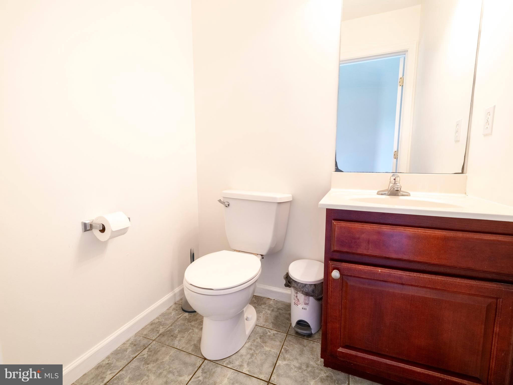 745 Apple Tree Lane Mount Wolf, PA 17347 - Photo 6 of 39 a bathroom with a sink toilet and mirror