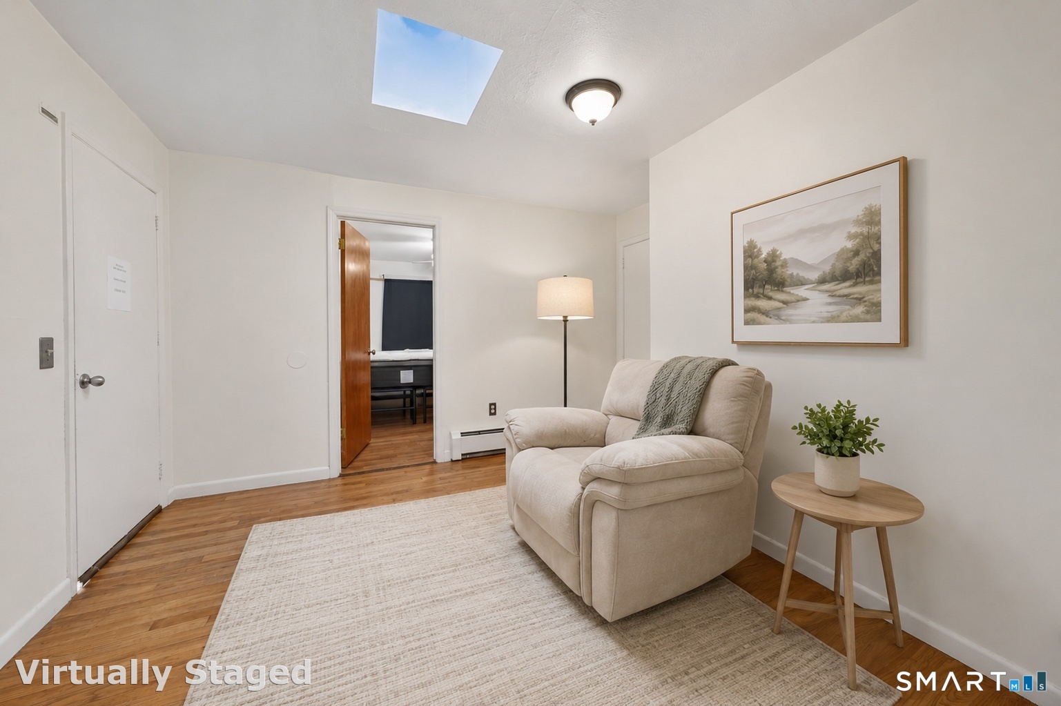 30 Grafton Road Hamden, CT 06517 - Photo 17 of 23 a spacious bedroom with a bed and a painting on the wall