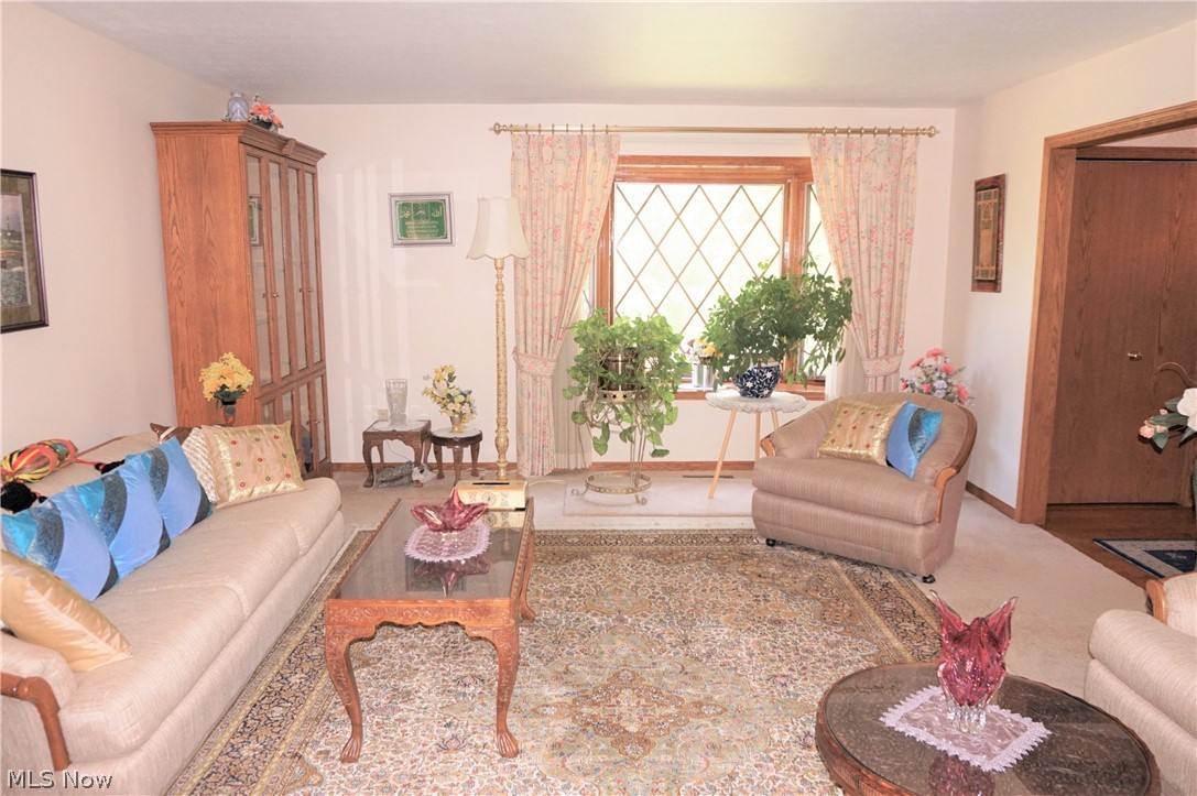 2577 Sourek Road Akron, OH 44333 - Photo 8 of 35 Formal living room to the right of foyer. Lovely bay window.