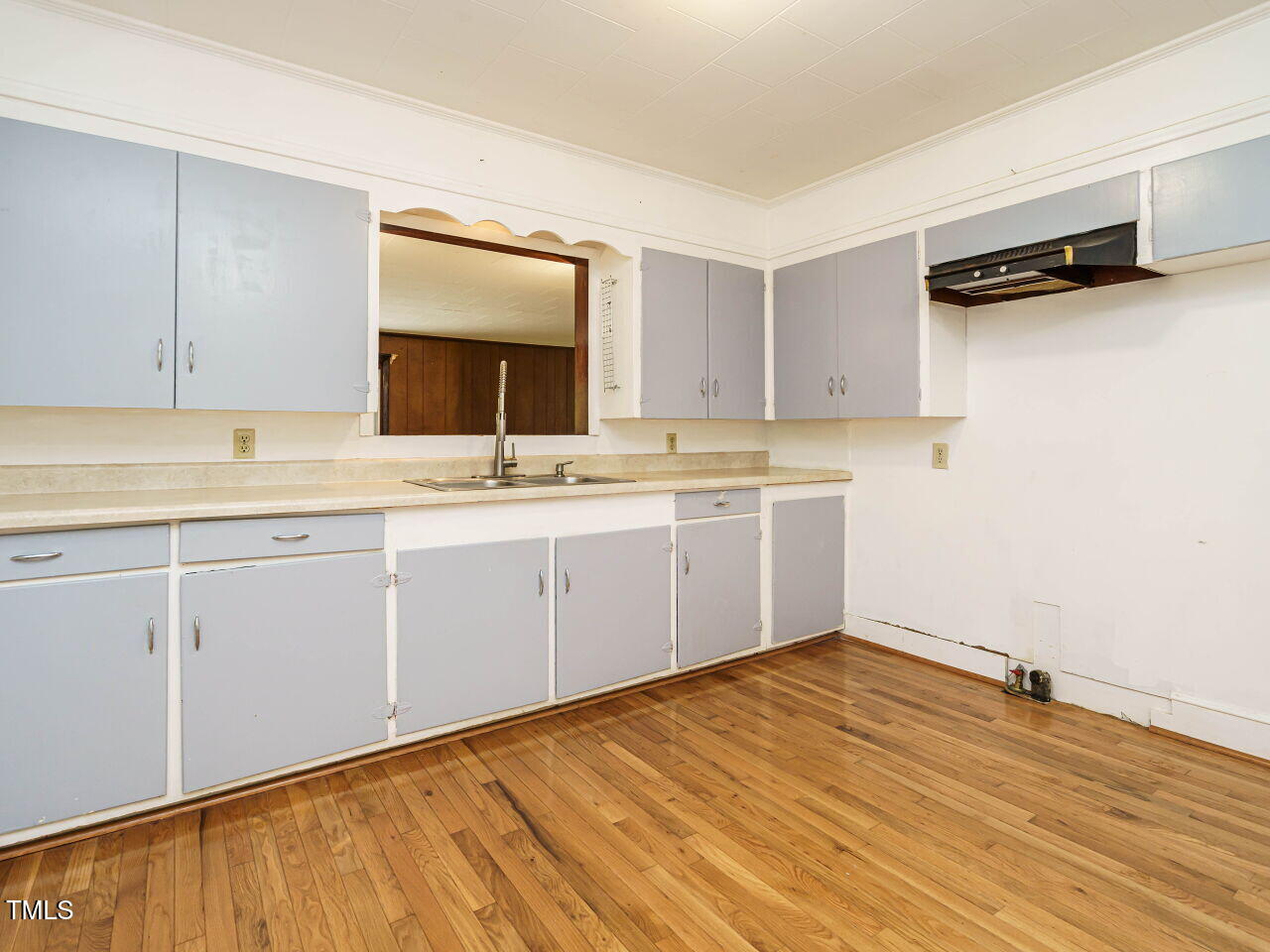 1191 Old Sanford Road Moncure, NC 27559 - Photo 16 of 30 a room with a sink cabinets and utility room