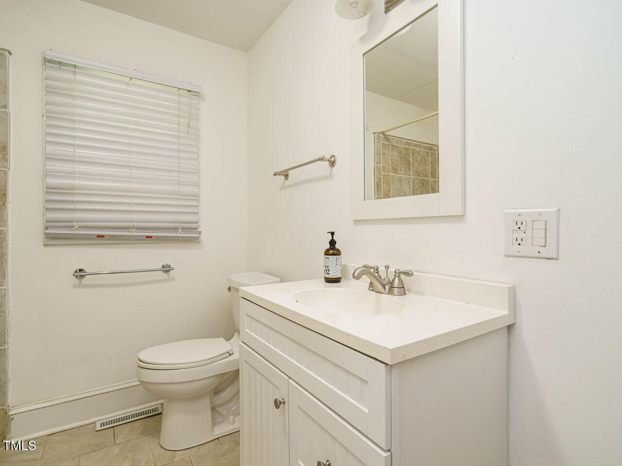 1191 Old Sanford Road Moncure, NC 27559 - Photo 20 of 30 a bathroom with a sink and a toilet