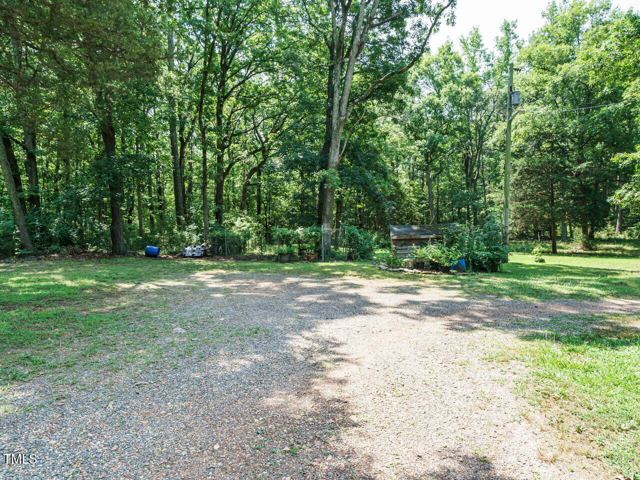 1191 Old Sanford Road Moncure, NC 27559 - Photo 27 of 30 a view of a yard with a trees