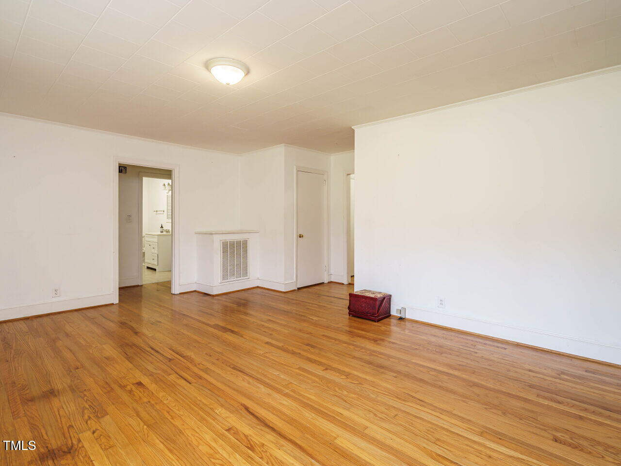 1191 Old Sanford Road Moncure, NC 27559 - Photo 7 of 30 a view of empty room with wooden floor
