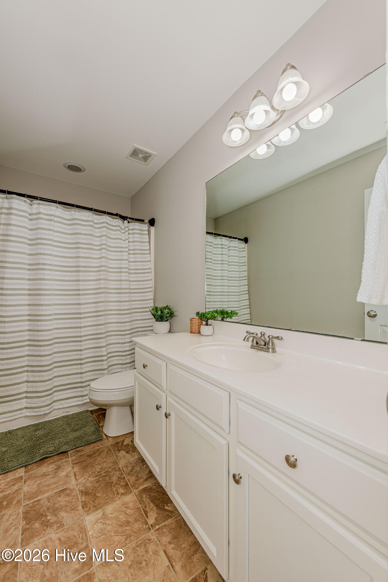 673 Morris Landing Road Holly Ridge, NC 28445 - Photo 62 of 125 Upstairs hall bathroom