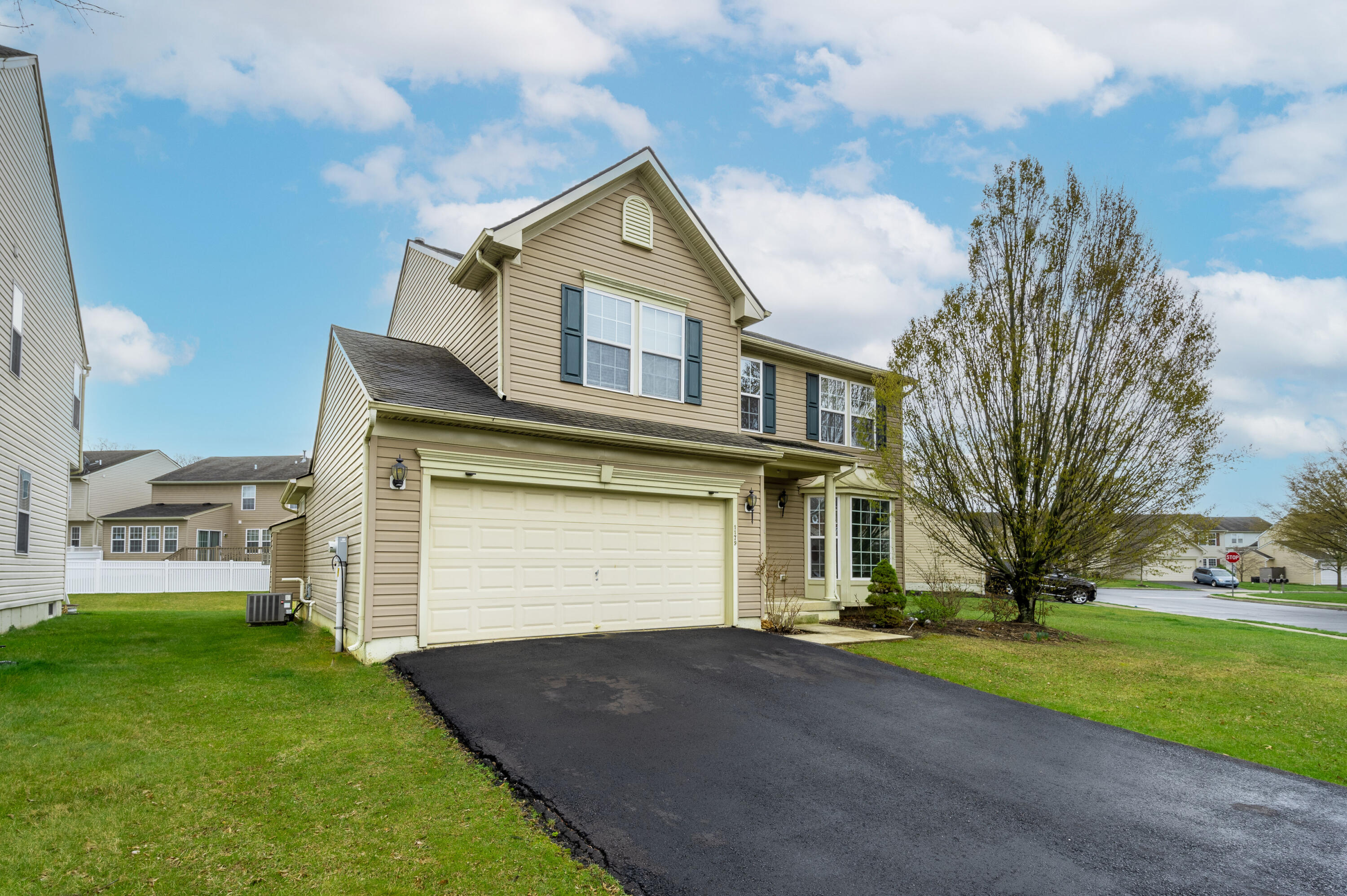 1179 Blair Road Bethlehem, PA 18017 - Photo 2 of 41 a front view of a house with a yard and garage