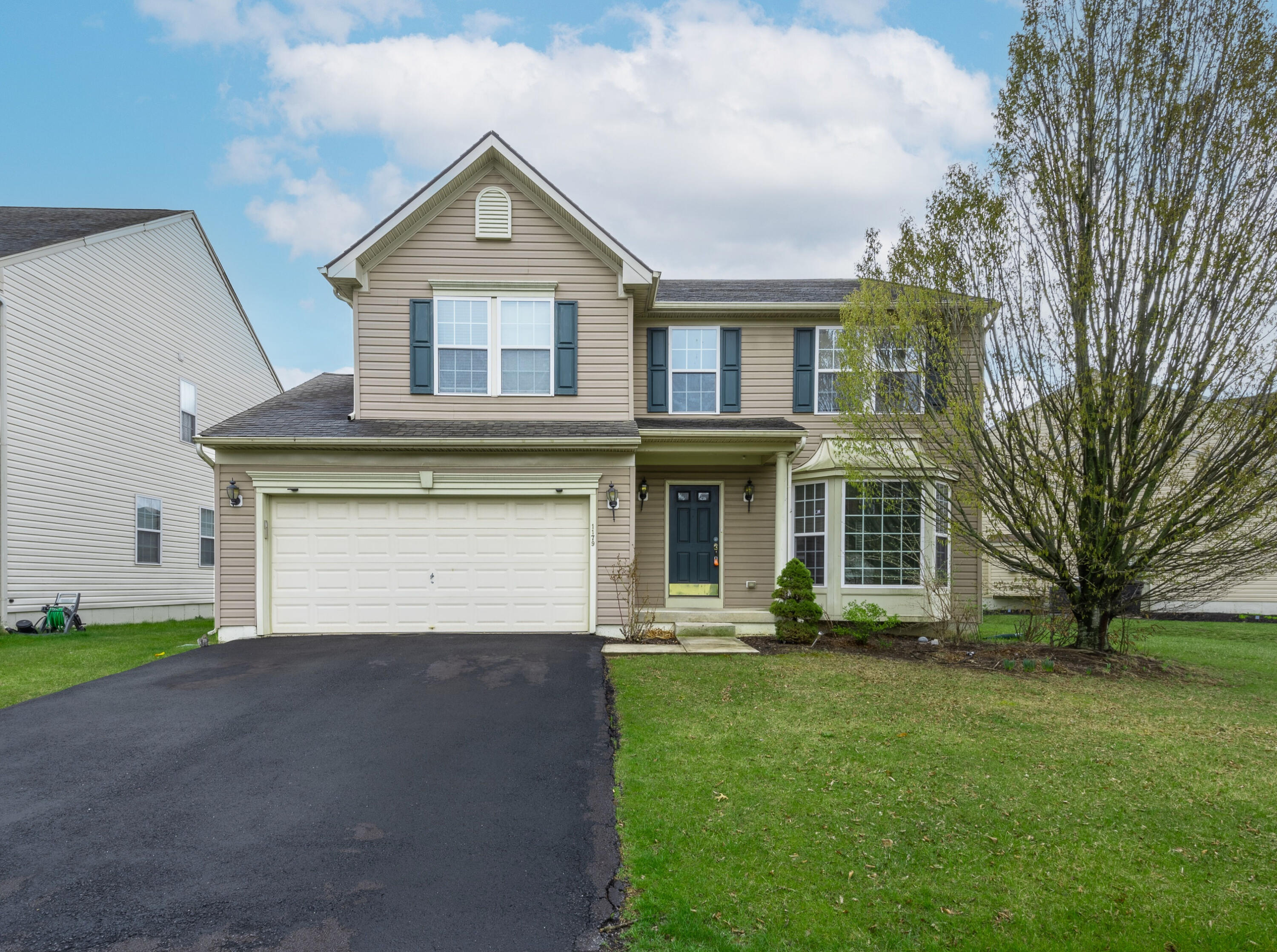 1179 Blair Road Bethlehem, PA 18017 - Photo 41 of 41 a front view of a house with a yard and garage