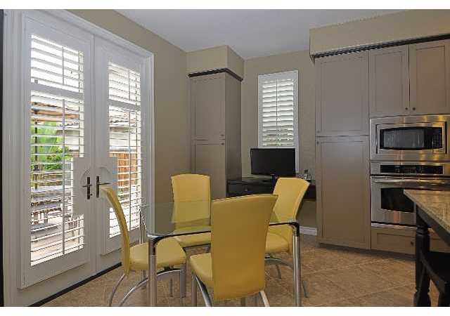 2709 Paradise Road Carlsbad, CA 92009 - Photo 14 of 24 Eat-in nook with French doors to backyard