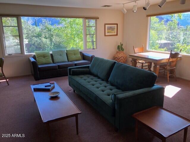 325 Smith Road Sedona, AZ 86336 - Photo 5 of 11 a living room with furniture and a window