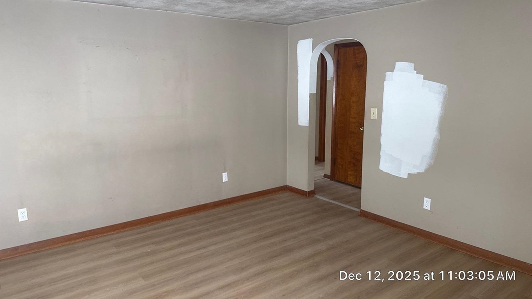11315 16th Street Milan, IL 61264 - Photo 3 of 9 a view of a room has wooden floor and a window