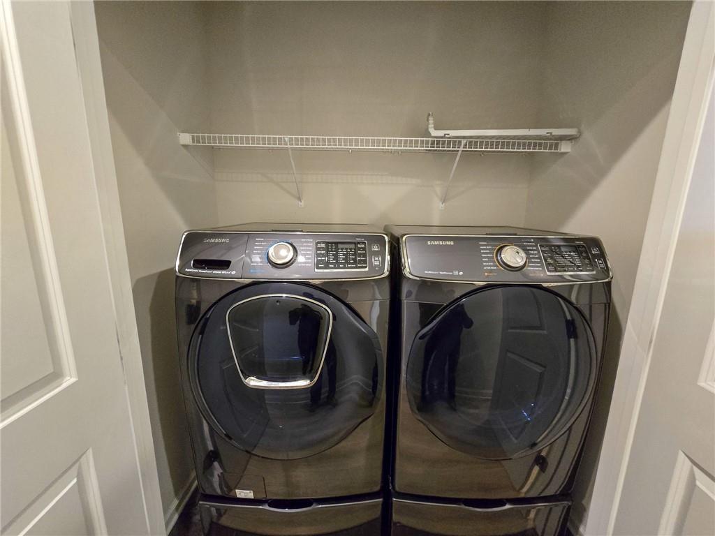 1758 Glenview Park Circle Duluth, GA 30097 - Photo 23 of 45 a utility room with dryer and washer