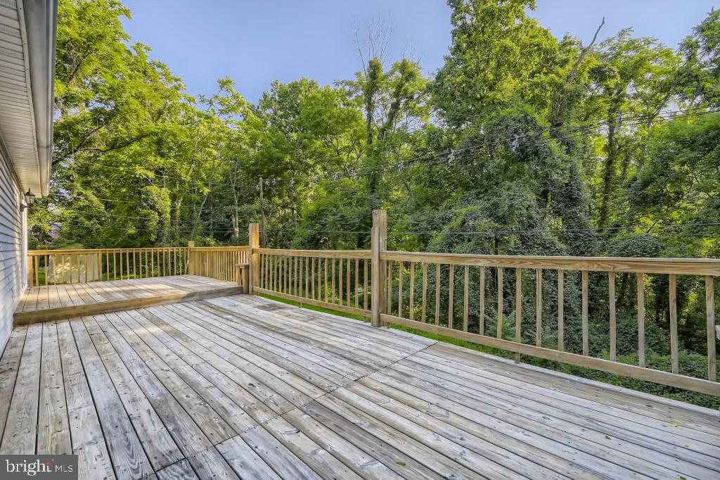 313 Nottingham Road Baltimore, MD 21229 - Photo 11 of 35 Huge Rear Deck the Entire Length of the house