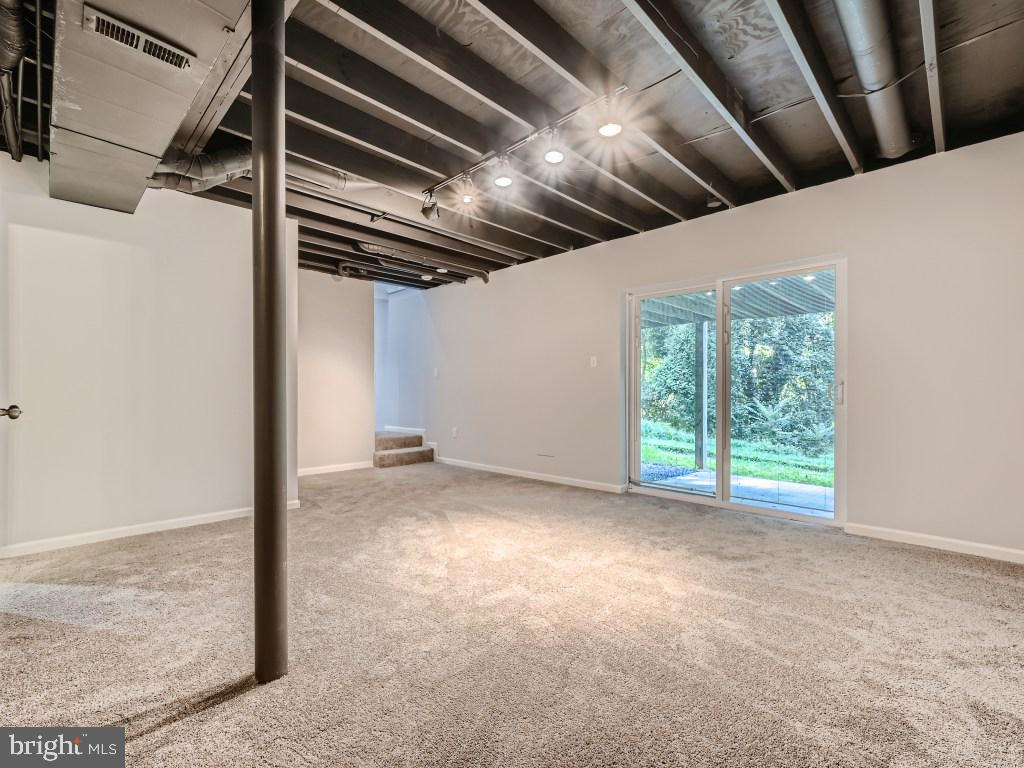 313 Nottingham Road Baltimore, MD 21229 - Photo 22 of 35 Basement has 2 large Entertainment Area's