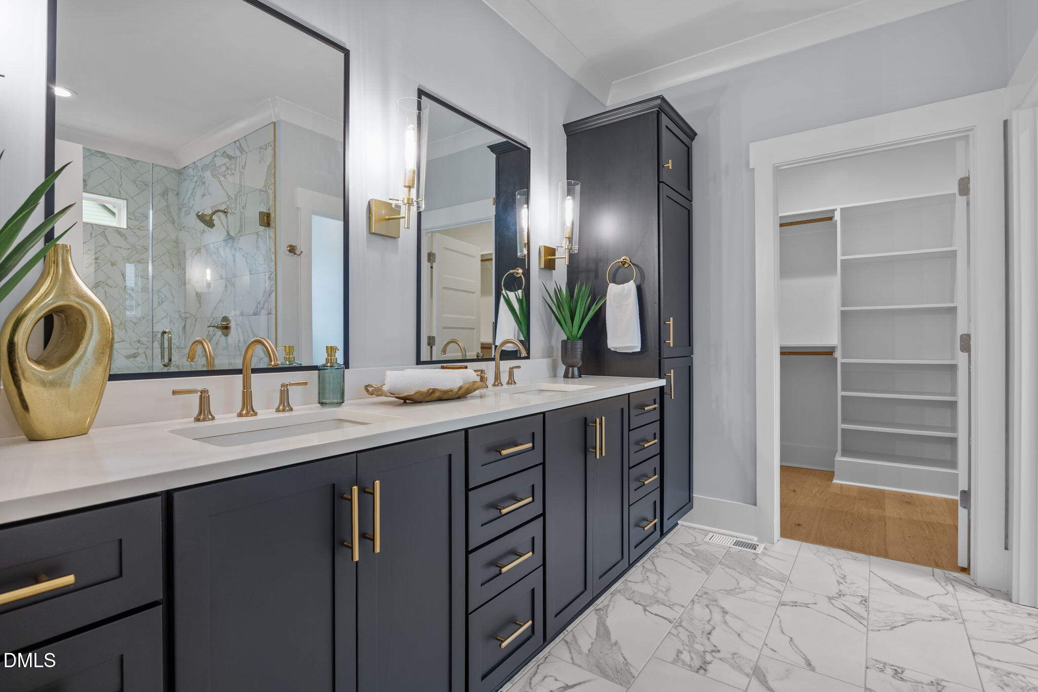 10 Carnation Road Youngsville, NC 27596 - Photo 15 of 44 a spacious bathroom with a granite countertop sink and a mirror