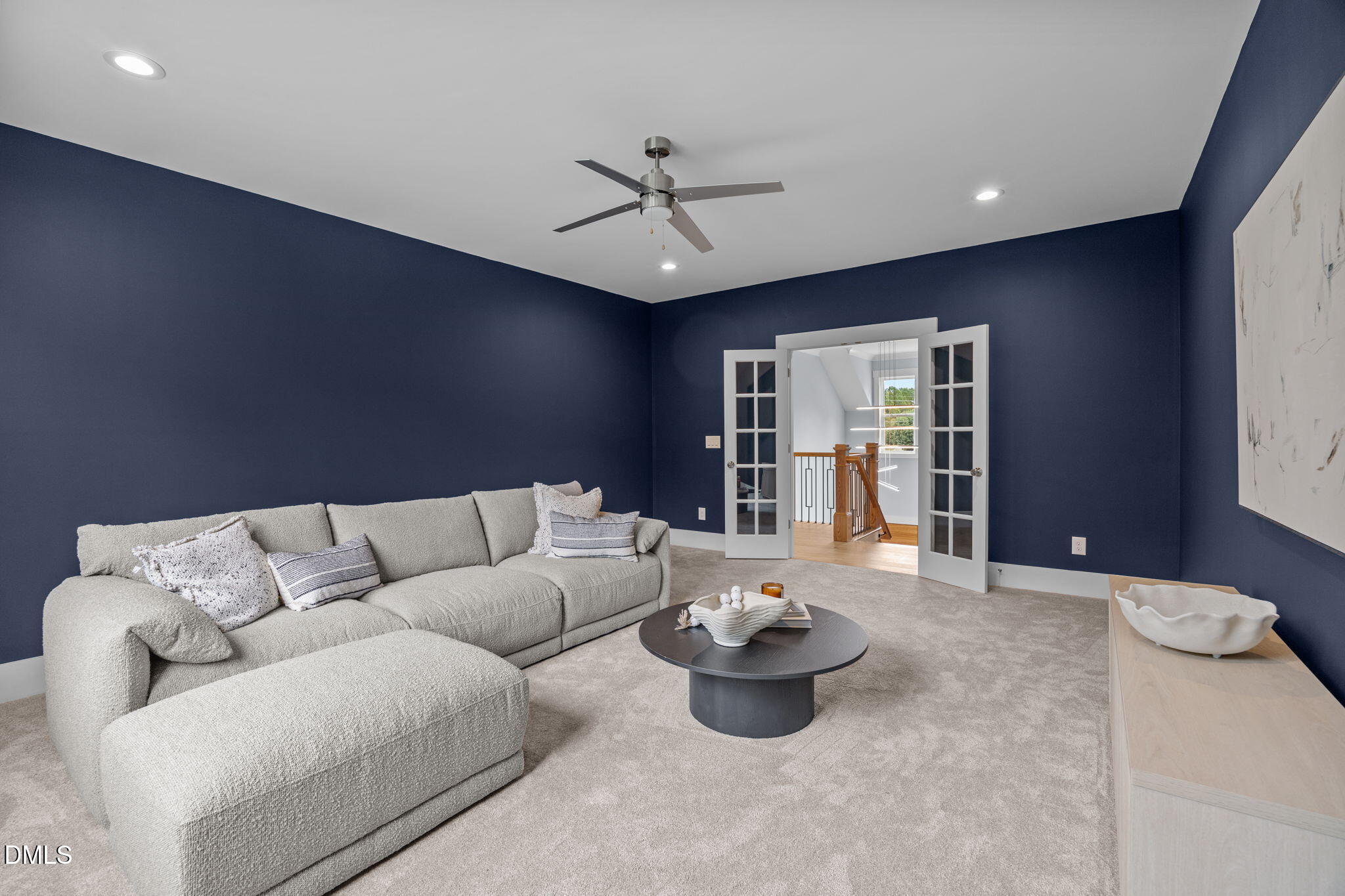 10 Carnation Road Youngsville, NC 27596 - Photo 31 of 44 a living room with furniture ceiling fan and a window