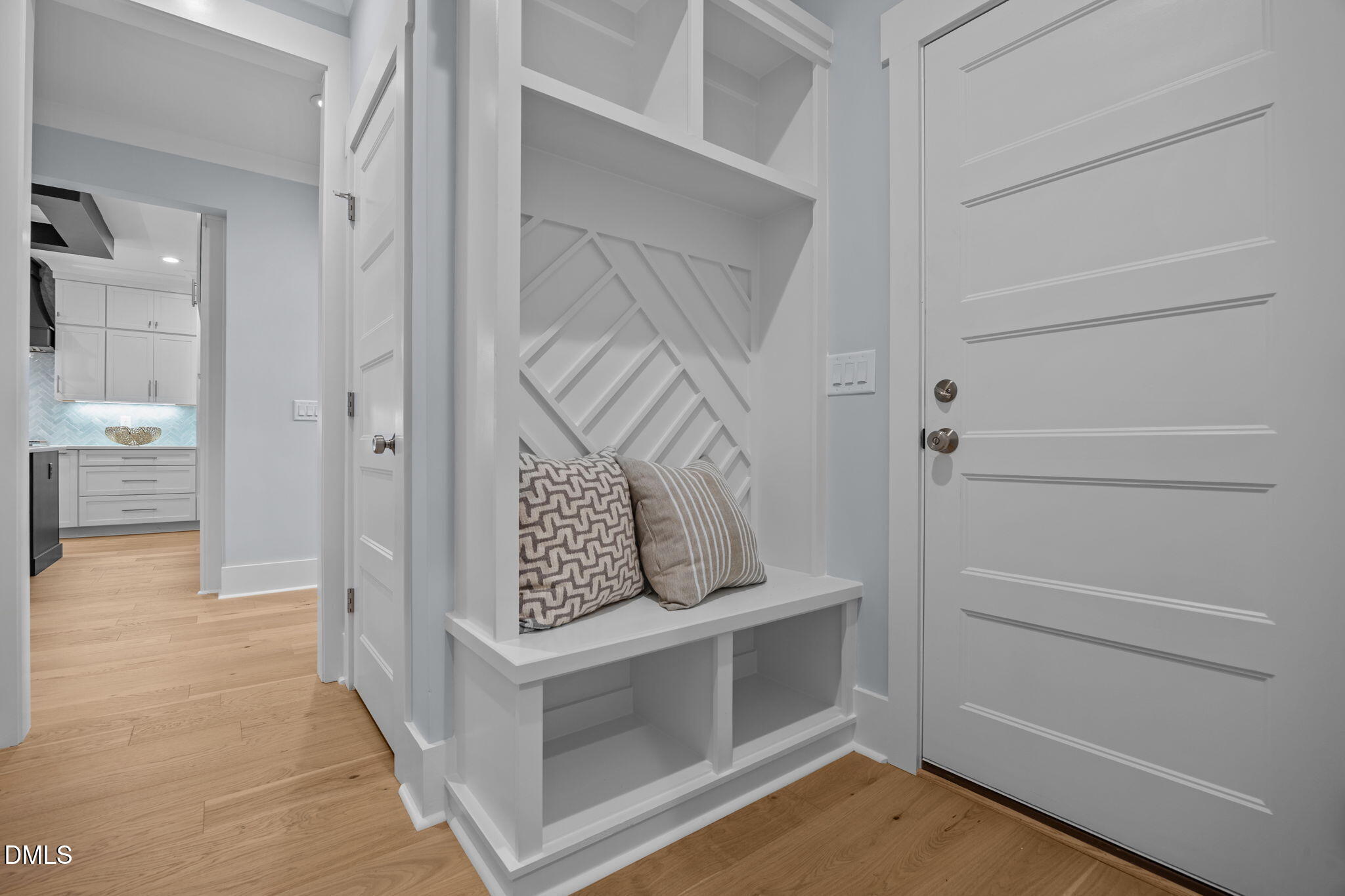 10 Carnation Road Youngsville, NC 27596 - Photo 33 of 44 a view of an entryway with wooden floor and a cabinet