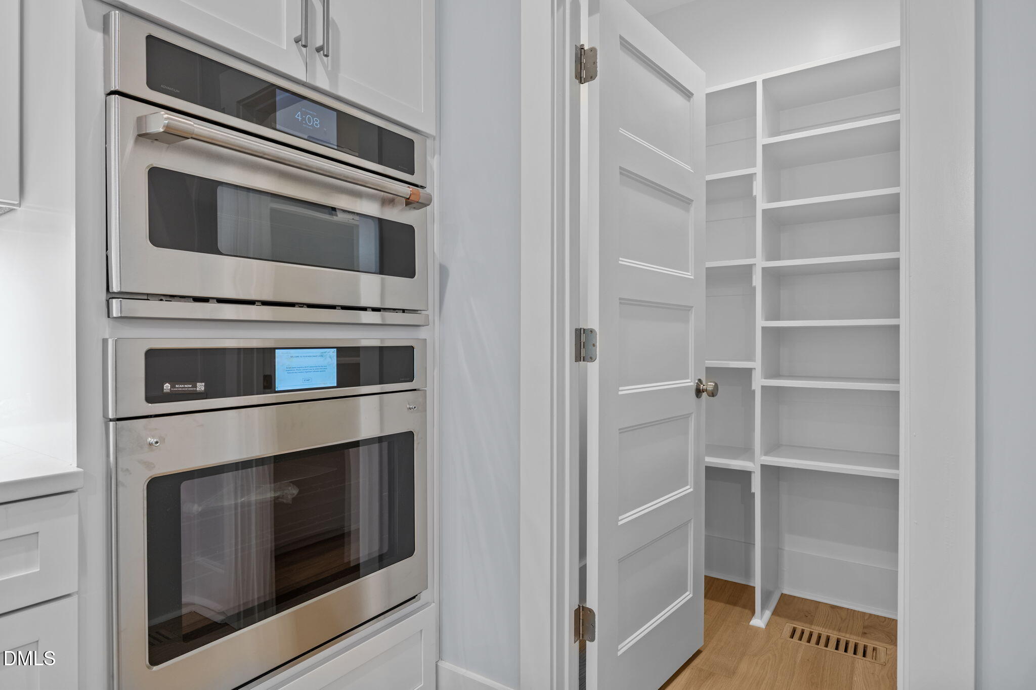 10 Carnation Road Youngsville, NC 27596 - Photo 7 of 44 a kitchen with cabinets and stainless steel appliances