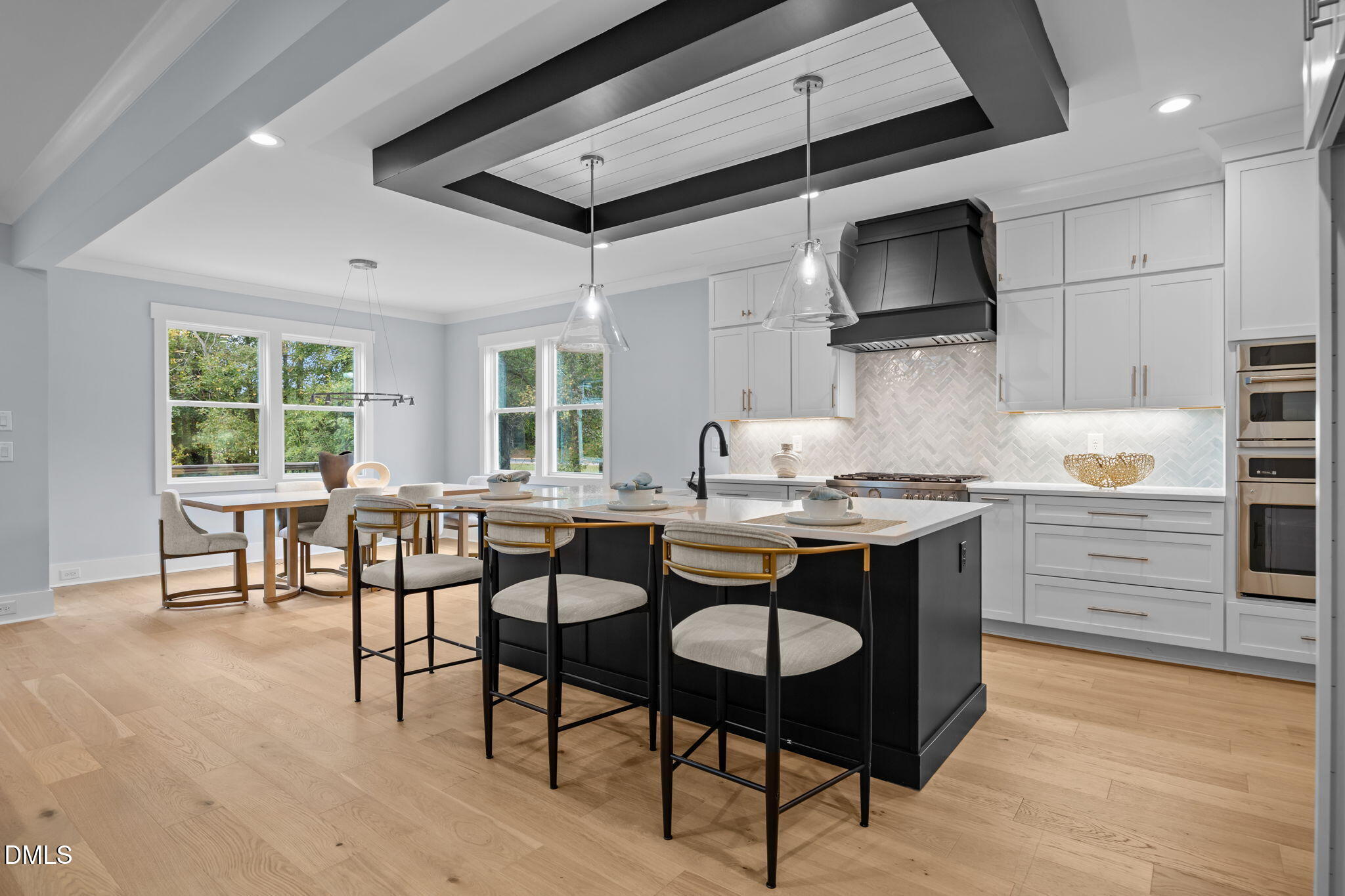 10 Carnation Road Youngsville, NC 27596 - Photo 8 of 44 a kitchen with kitchen island granite countertop a sink cabinets and stainless steel appliances