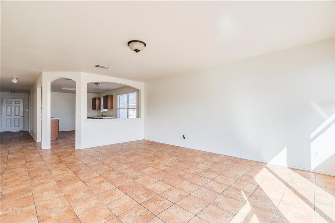 116 Keegans Way Kyle, TX 78640 - Photo 14 of 30 a view of a livingroom with wooden floor
