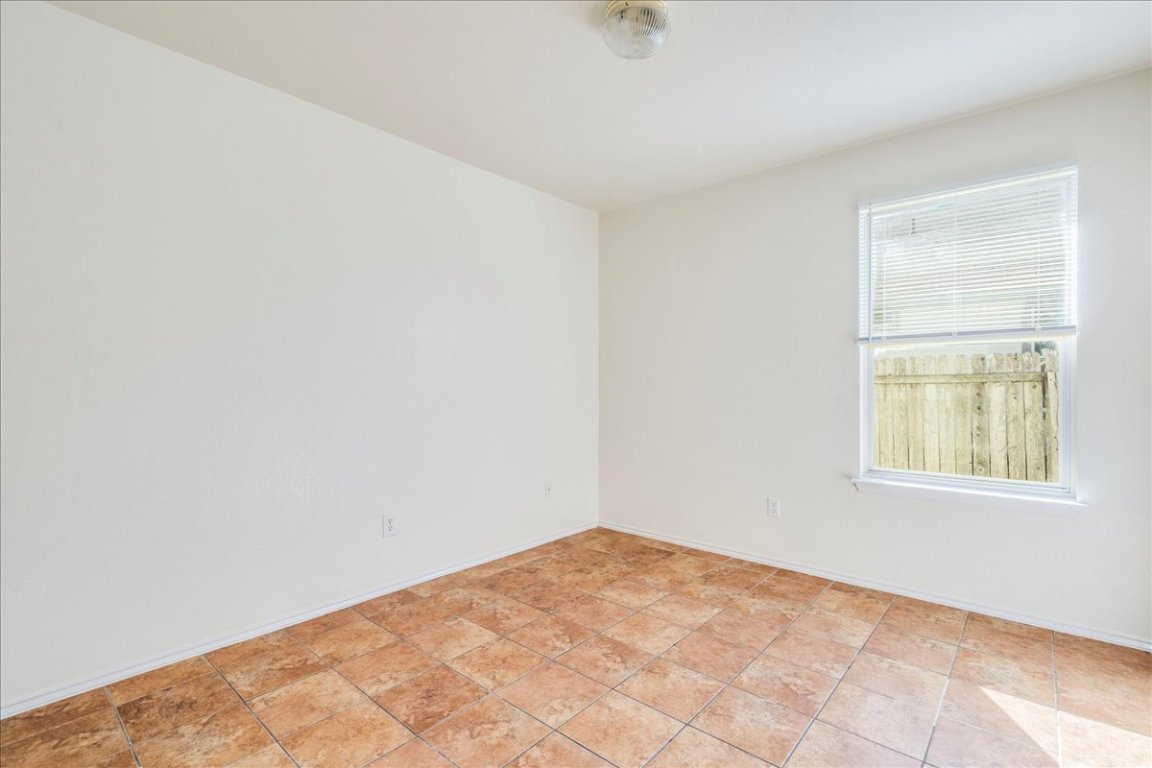 116 Keegans Way Kyle, TX 78640 - Photo 19 of 30 an empty room with windows