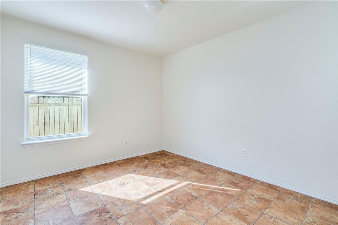 116 Keegans Way Kyle, TX 78640 - Photo 21 of 30 an empty room with a window