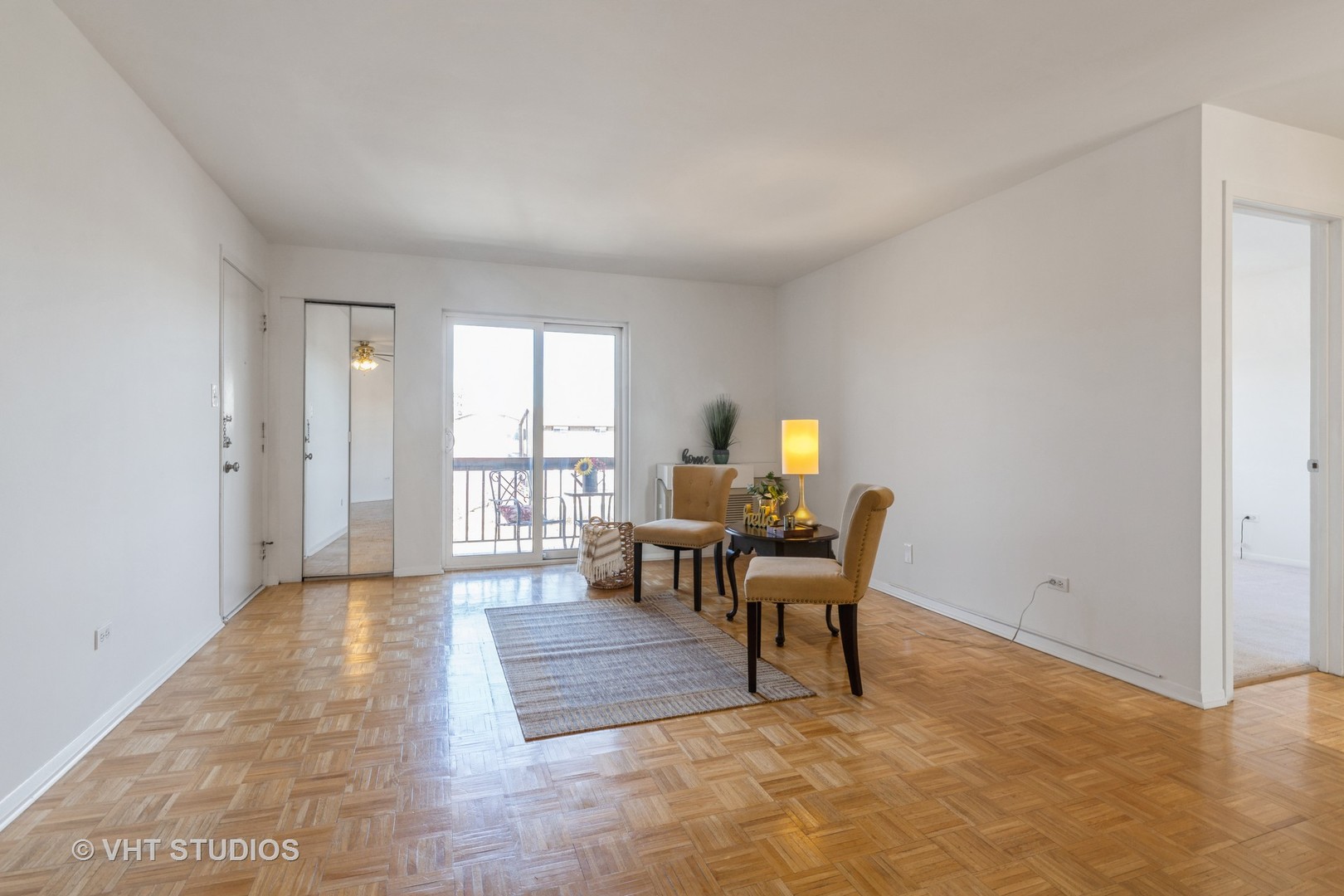 2205 West Nichols Road, Unit F Arlington Heights, IL 60004 - Photo 3 of 15 a view of a workspace with furniture and a window