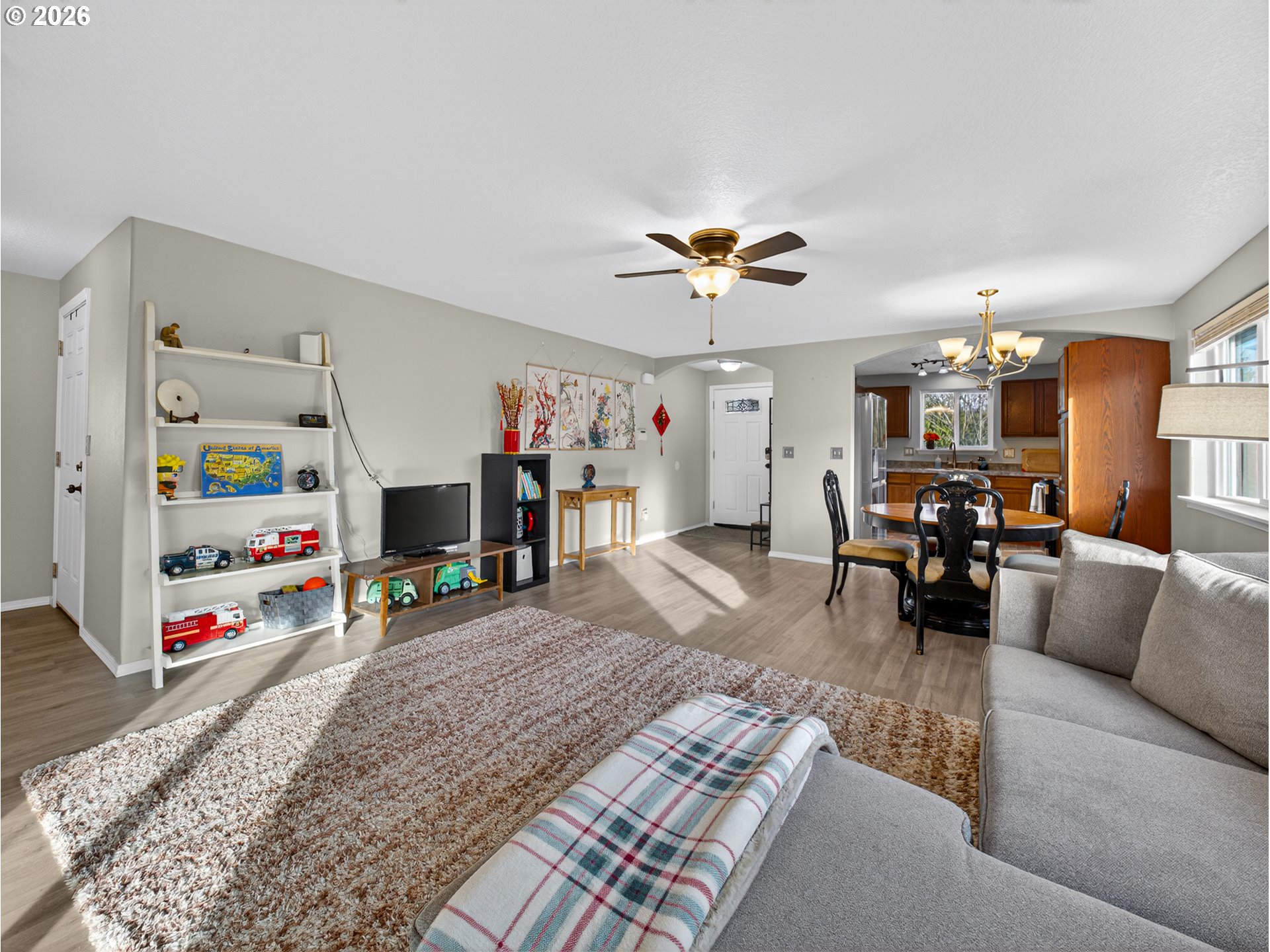 847 Northeast Duniway Road Lafayette, OR 97127 - Photo 12 of 38 a living room with furniture and a wooden floor